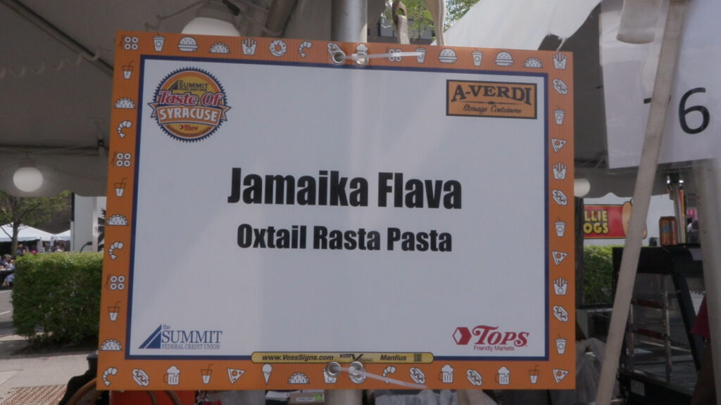 Sign describing which food was at the tent 