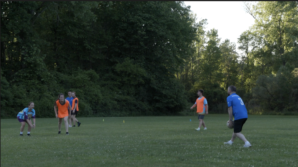 Coach Sean Rooney ready to toss the ball to begin play.