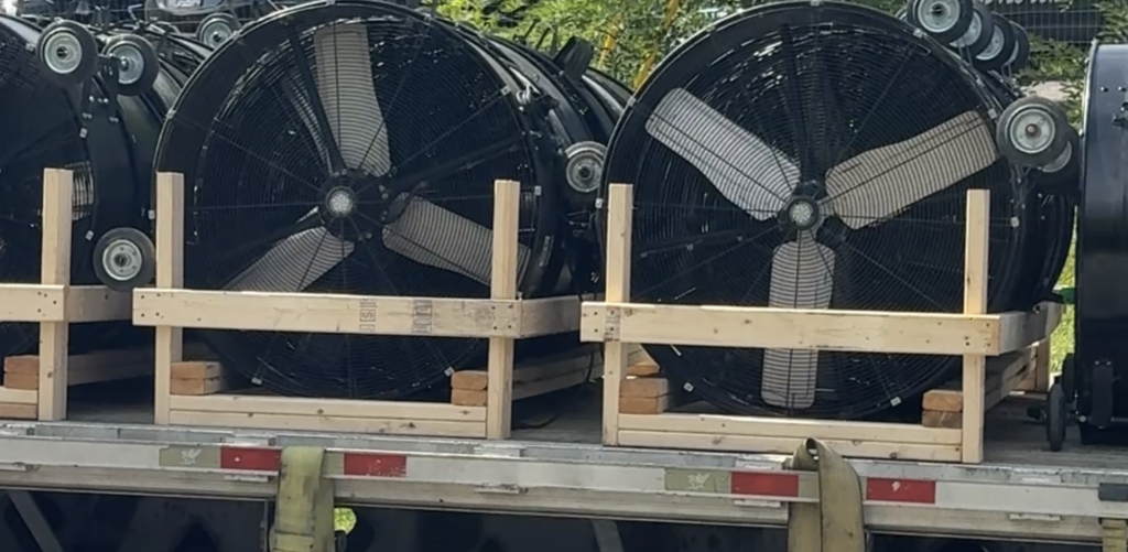 Large fans on a truck bed