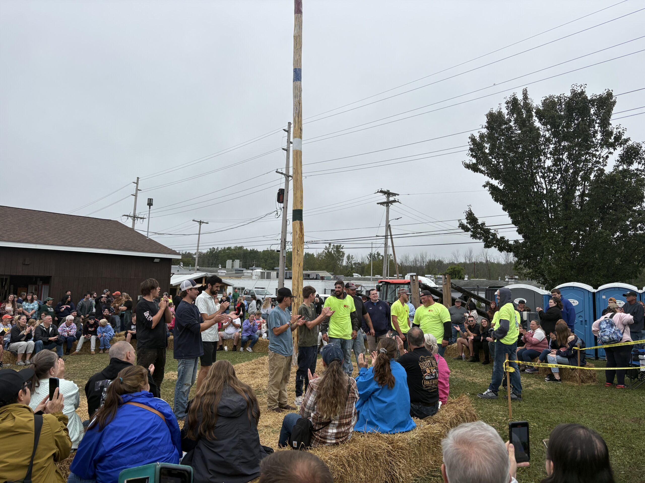 Competitors at 2026 Grease Pole Climb