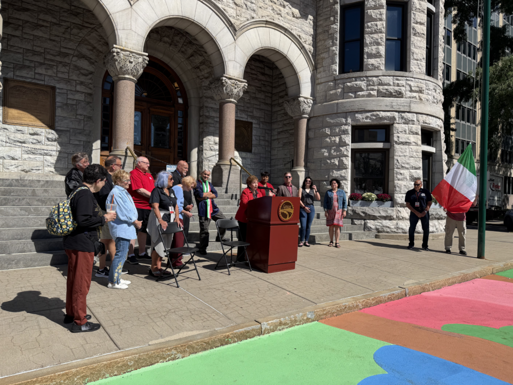 The La Festa Italiana Committee and Syracuse City Hall workers kick off the Italian Festival