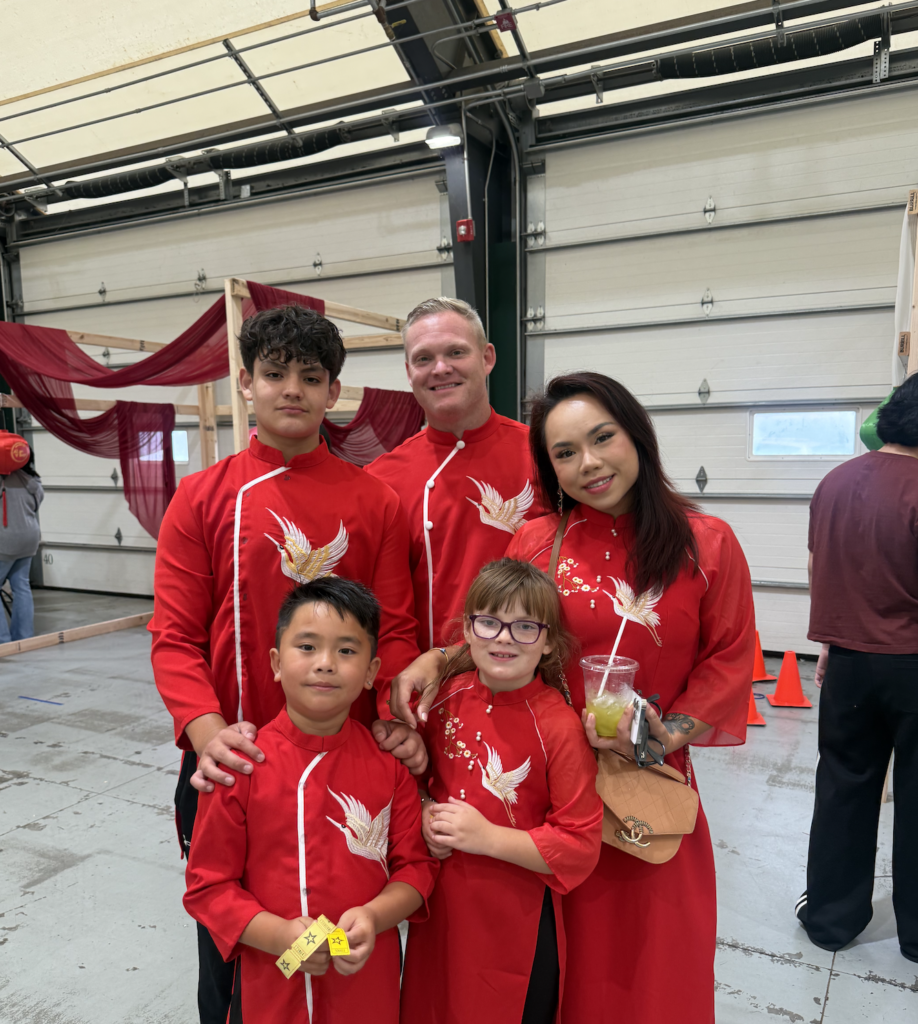 Le attended the festival with her family dressed in traditional Vietnamese dress.