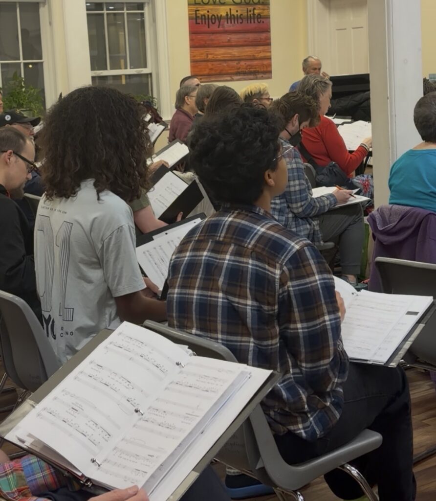 Chorus member rehearses music