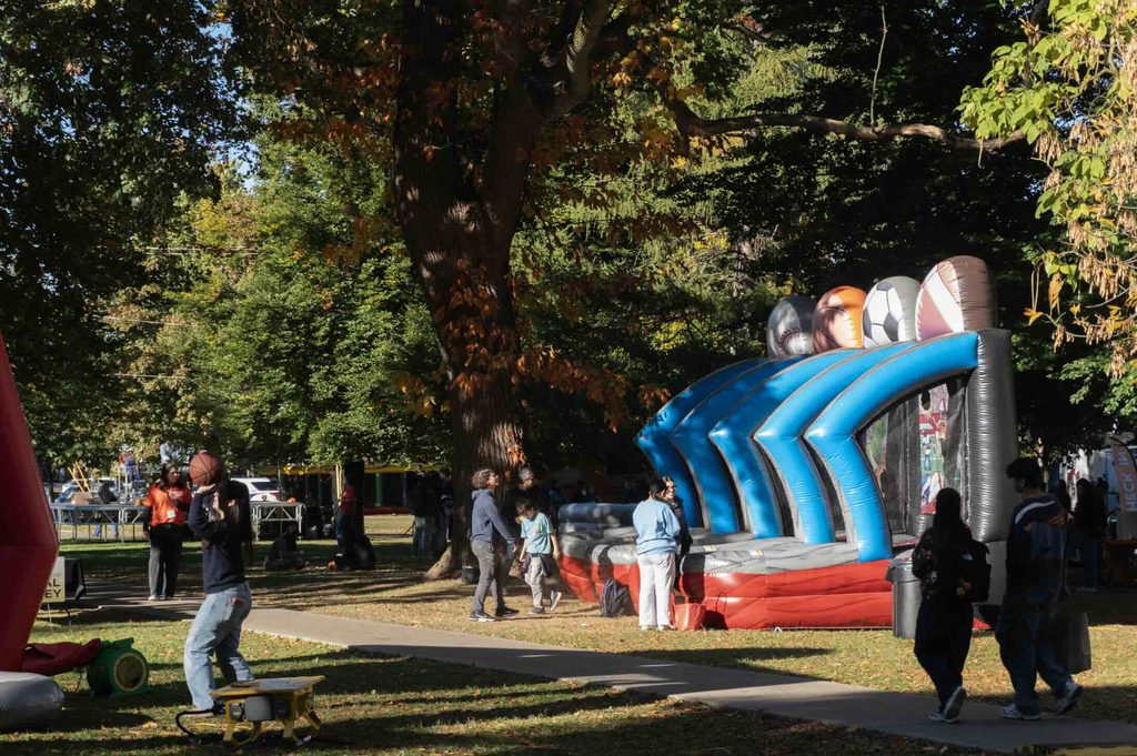 People doing activities at Harvest Fest